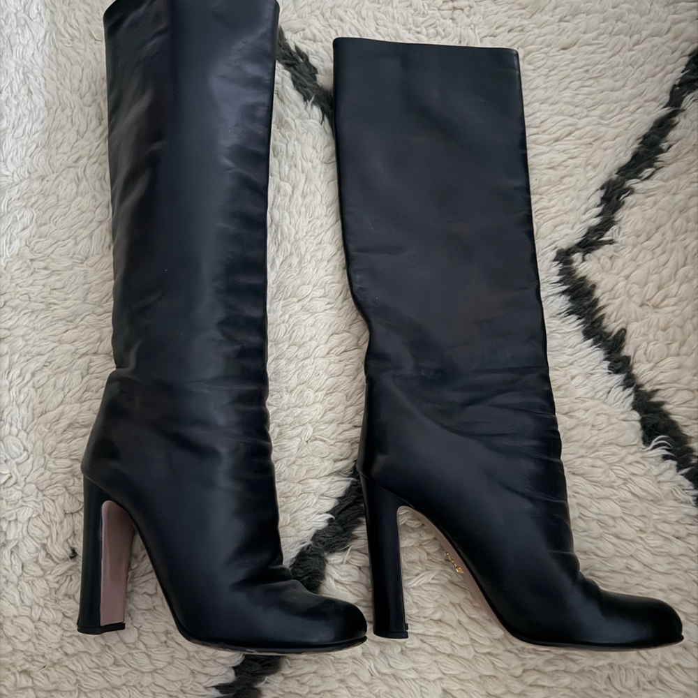 Black knee high Prada boots